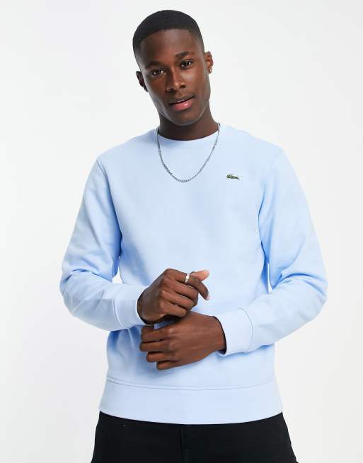 Lacoste small logo neck sweatshirt in light blue | ASOS