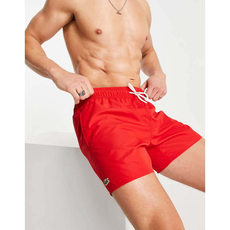 Lacoste small logo swim shorts in red