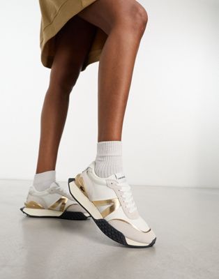 Lacoste Spin Deluxe trainers in white and gold - ASOS Price Checker