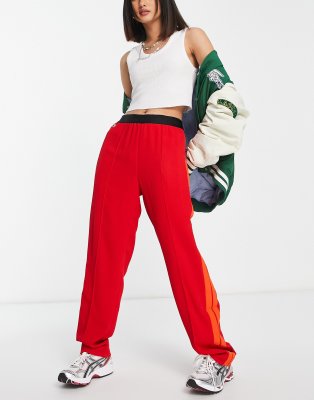 Lacoste sporty track pants in red | ASOS