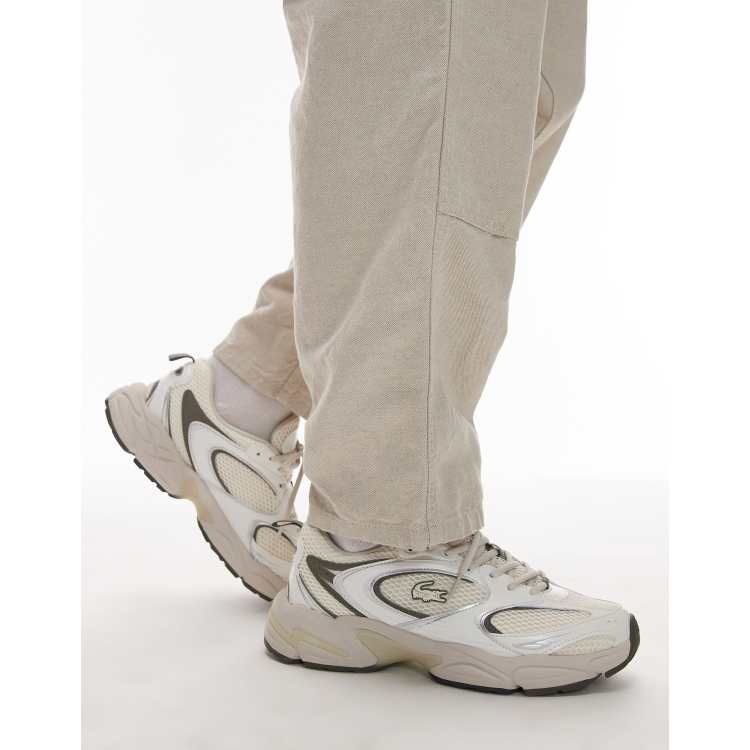Lacoste - Storm 96 2K - Sneakers in gebroken wit/kaki | ASOS