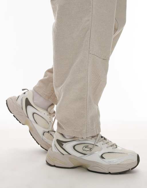 Lacoste - Storm 96 - Sneakers in wit en kaki