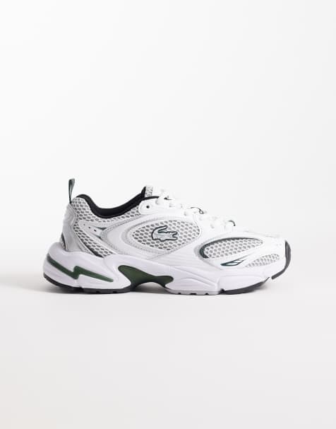 Lacoste - Storm 96 - Sportieve sneakers met logo in wit en grijs - view 1