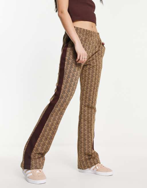 Lacoste straight fit drawstring pants in brown with all over print
