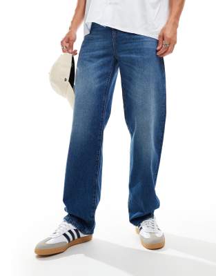 Lacoste Lacoste straight leg jeans in dark blue wash