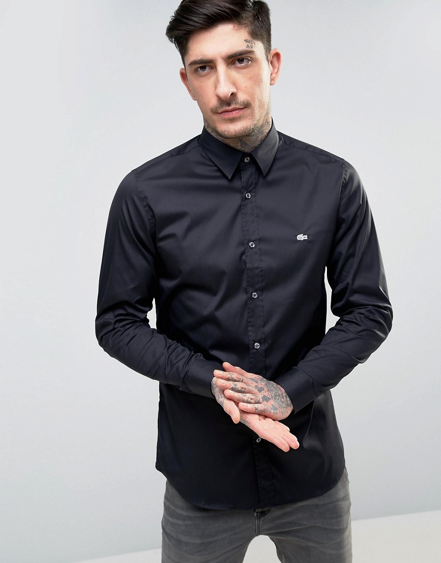 Lacoste – Svart poplinskjorta med stretch och smal passform
