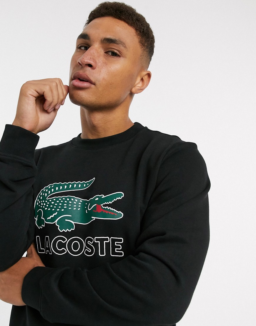 Lacoste – Svart sweatshirt med logga och rund halsringning-Vit