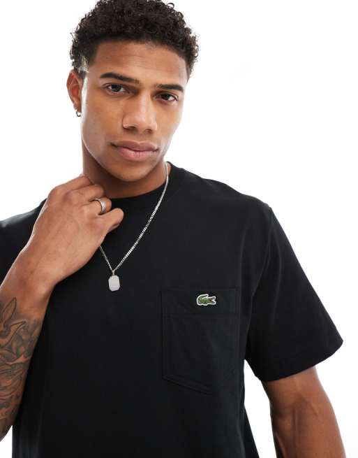 Lacoste – Svart t-shirt med logga på fickan
