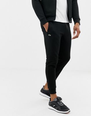 Lacoste – Svarta mjukisbyxor i sweat-material med smal passform och logga