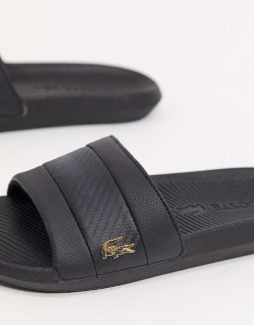 Lacoste – Svarta tofflor med guldfärgad krokodillogga, 3 av 4