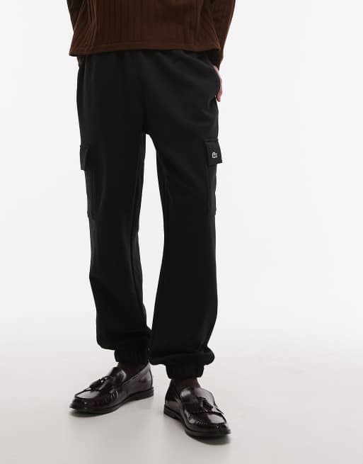 Lacoste sweatpants in black with cargo pockets