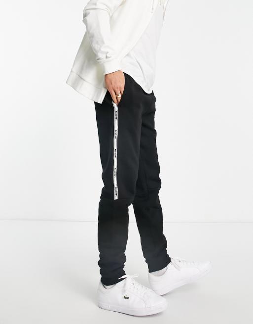 Lacoste sweatpants with side taping in black