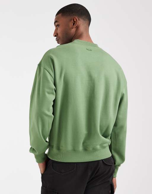 Lacoste – Sweatshirt in Grün mit Logostickerei und Rundhalsausschnitt, 3 von 5