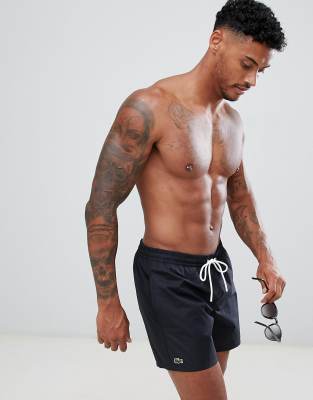 Lacoste swim shorts in black | ASOS