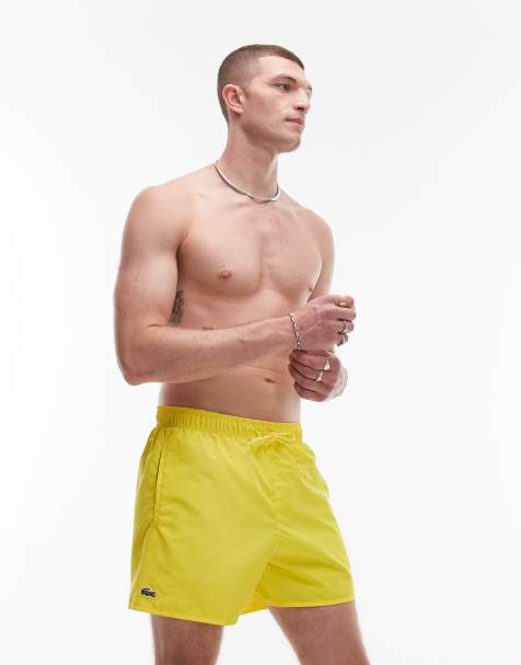 Lacoste swim shorts in yellow - view 1