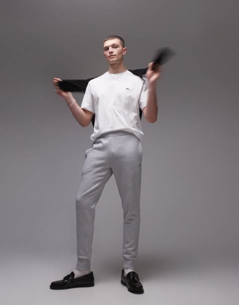 Lacoste – Szare dopasowane spodnie dresowe z logo - view 1