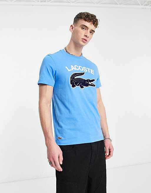Lacoste – T-Shirt in Blau mit großem Logo und Krokodil-Print | ASOS