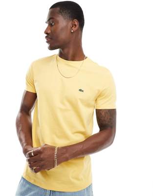 Lacoste T-shirt in piquè con colletto a righe bianco latte