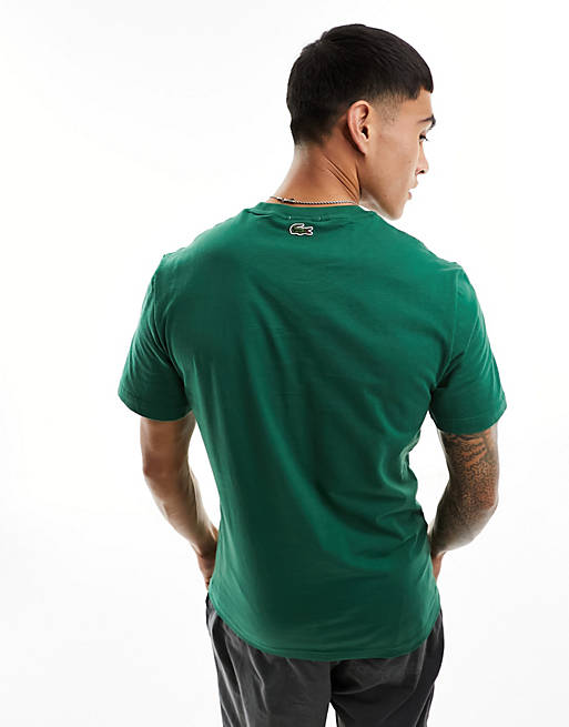 Lacoste – T-Shirt in Dunkelgrün mit großem Logo vorne | ASOS