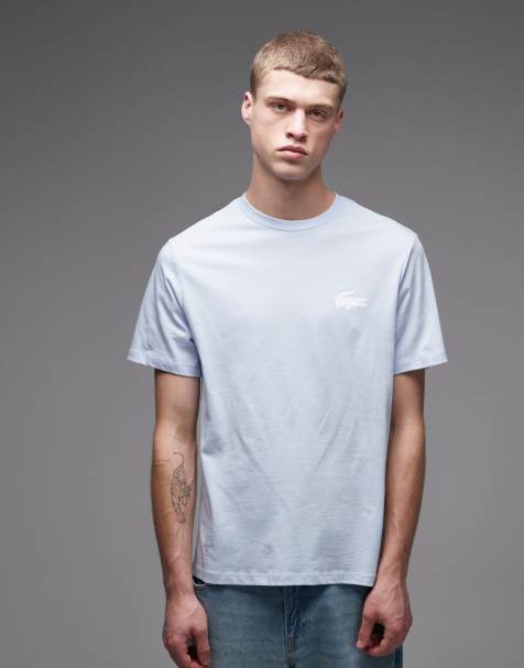 Lacoste – T-Shirt in Hellblau mit Logo - view 1
