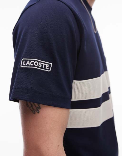 Lacoste t-shirt in navy with white panel inserts ASOS