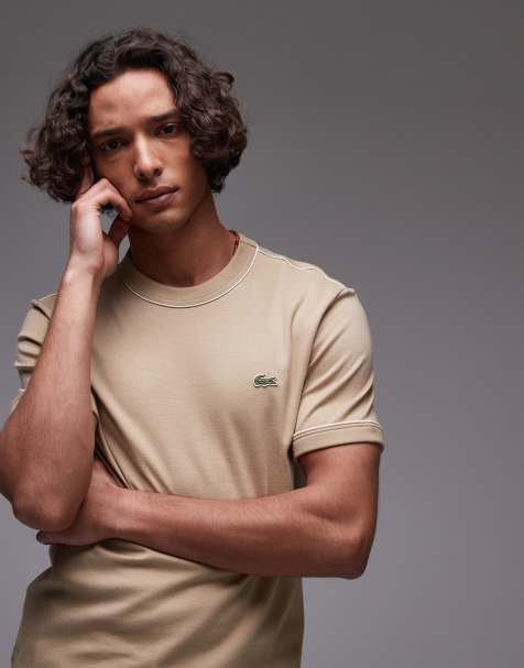 Lacoste t-shirt in white with navy trim and sleeve cuff detail