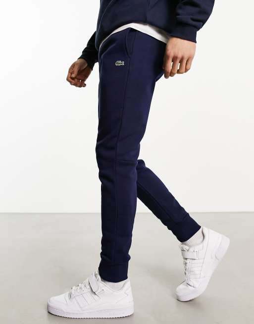 Lacoste tapped logo tapered fit joggers in navy