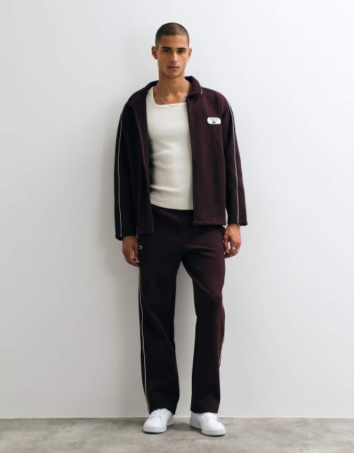 Lacoste Tennis Heritage Jogginghose mit Paspelierung in Burgunderrot, 1 von 5
