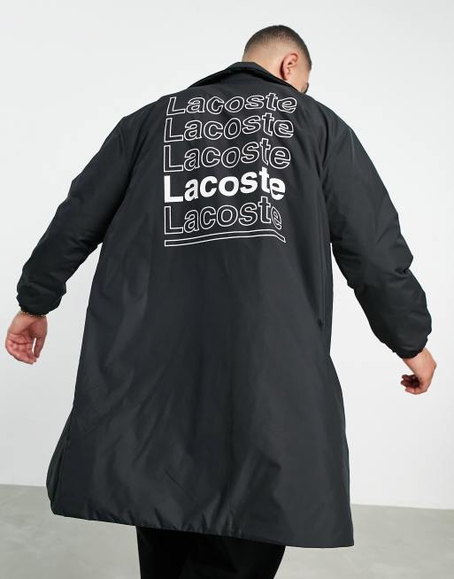 Lacoste text back print trench in black 