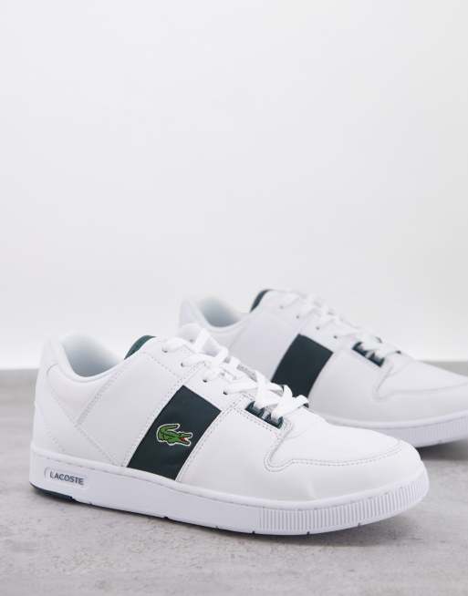 kommentar vinden er stærk Fundament Lacoste Thrill sneakers in white with green stripe | ASOS