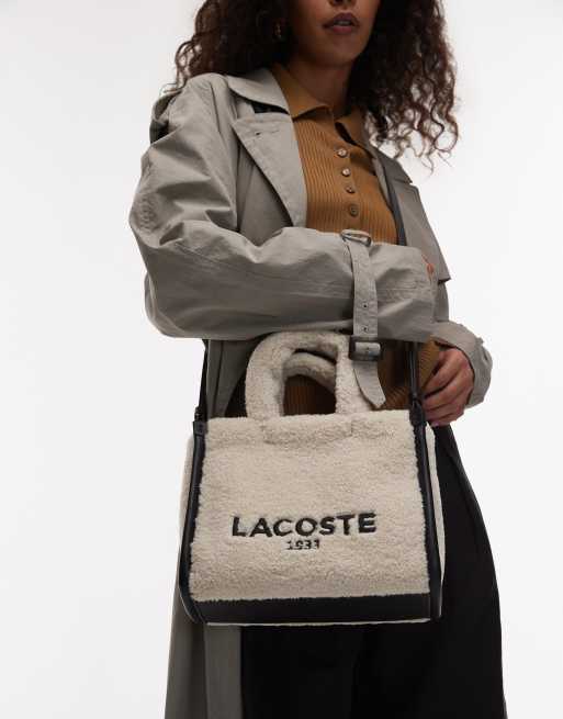 Lacoste – Torebka crossbody z kożuszka w kolorze naturalnym i czarnym