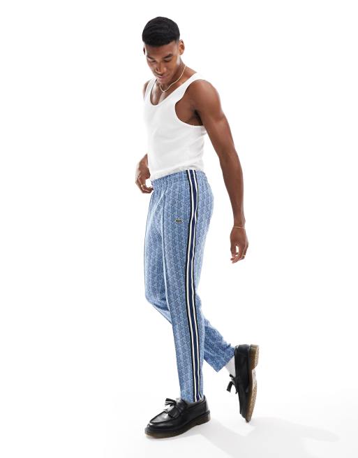 Lacoste track pants in monogram print