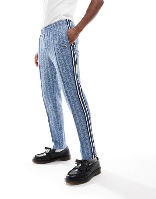 Lacoste track pants in monogram print ASOS