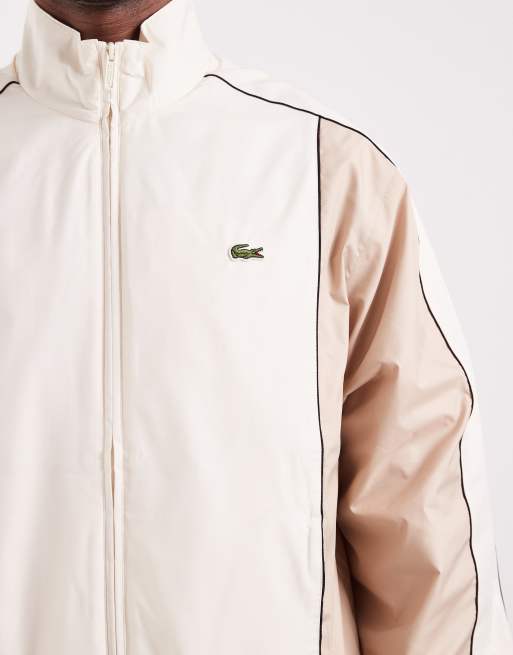 Lacoste – Trainingsjacke mit Blockfarbendesign in Weiß und Beige, 3 von 5