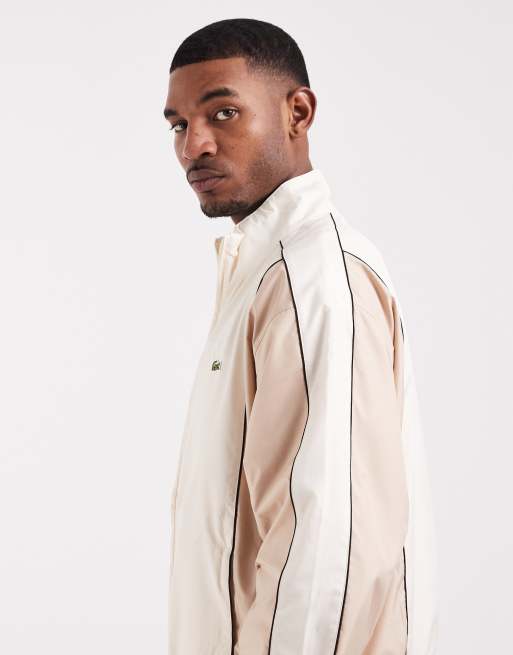 Lacoste – Trainingsjacke mit Blockfarbendesign in Weiß und Beige, 4 von 5