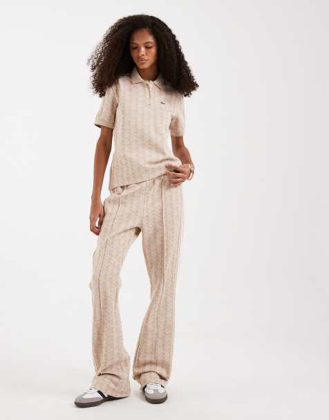 Lacoste - Tuta sportiva rosa chiaro con monogramma - view 1