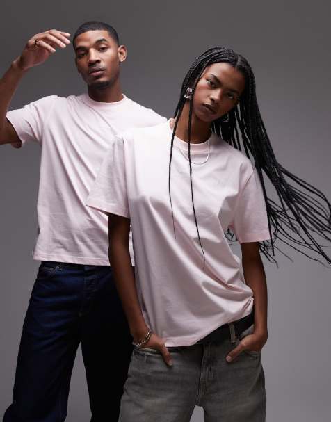 Lacoste - Unisex - Lyserød T-shirt med lille, centralt logoprint i afslappet pasform - view 1