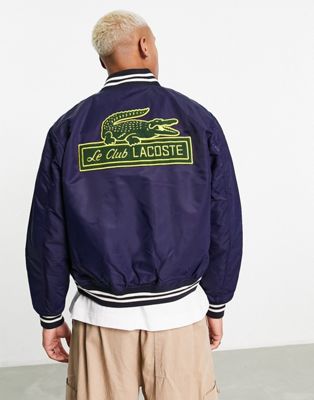 Lacoste varsity jacket in navy with patches and back print | ASOS