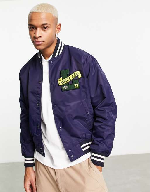 Lacoste varsity jacket in navy with patches and back print