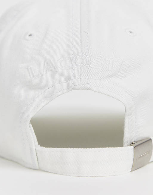 Lacoste – Weiße Baseball-Cap mit seitlichem Logo | ASOS