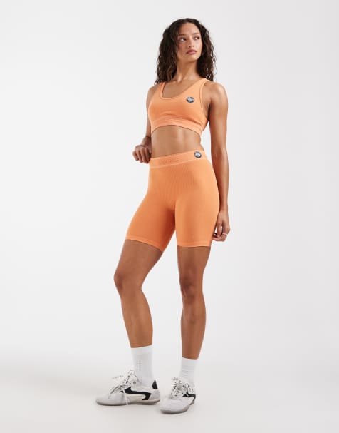 Lacoste x Roland Garros lounge shorts in orange