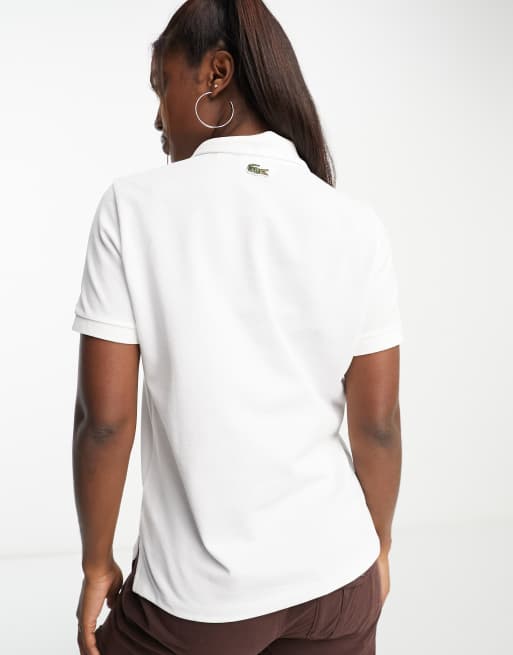 Lacoste x Stranger Things logo polo shirt in white | ASOS