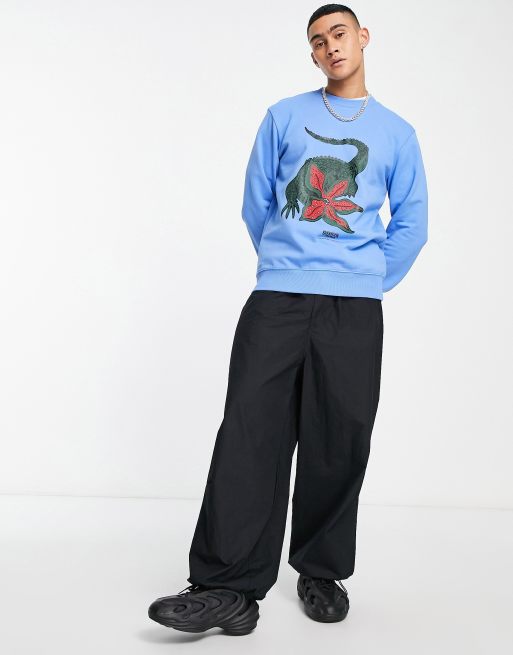 Lacoste x Stranger Things – Niebieska bluza z nadrukiem graficznym z przodu, 2 z 4