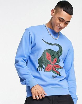 Lacoste x Stranger Things sweatshirt in blue with front graphics - ASOS Price Checker