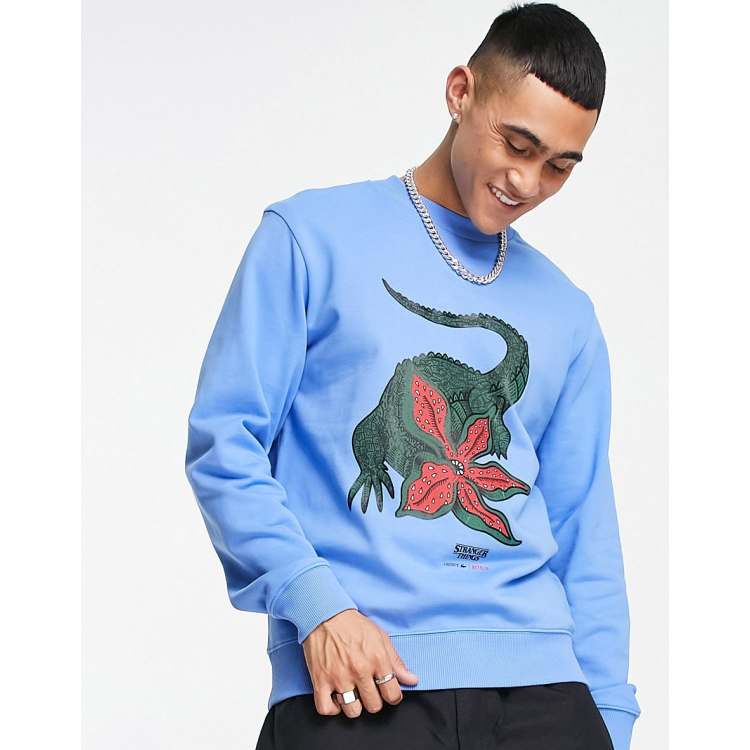 Lacoste x Stranger Things sweatshirt in blue with front graphics