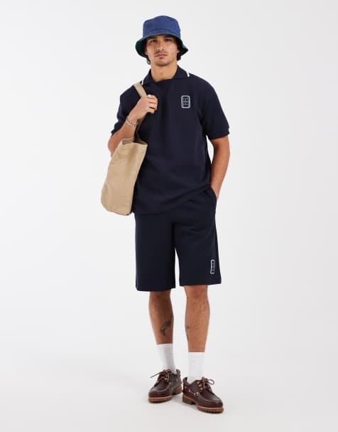 Lacsote co-ord short sleeve loose fit logo polo shirt in navy - view 1