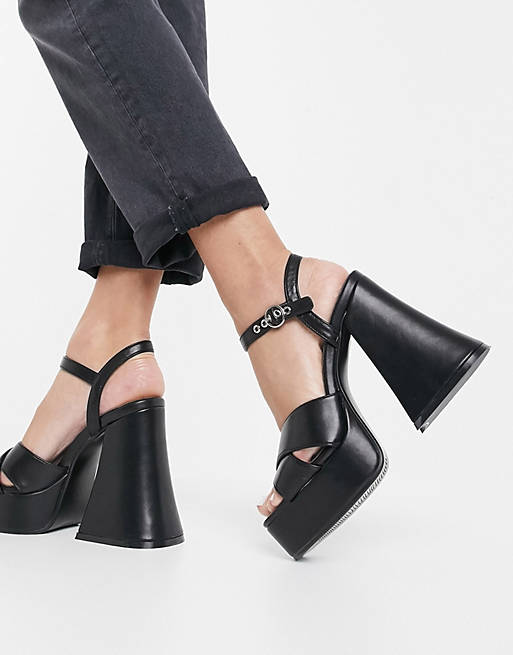 حامض ثانيا القرفصاء  Lamoda flared heel platform sandals in black | ASOS
