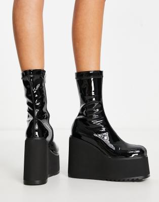 black vinyl platform boots