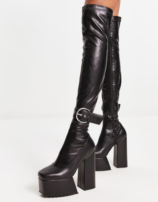 Black platform shop boots with buckles