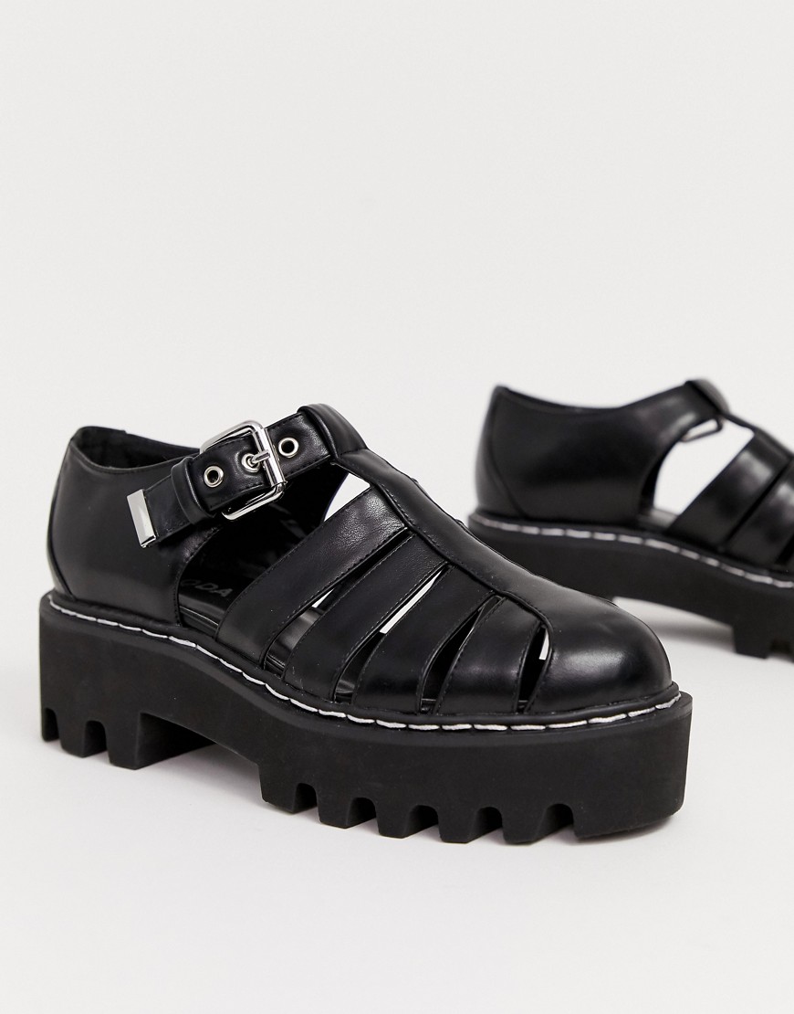 Lamoda – Svarta grova flatform-skor med remmar